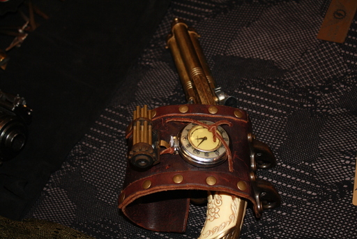 A wrist gun with a clock