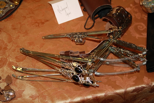 Springy brass hand doohicky thingamajig
